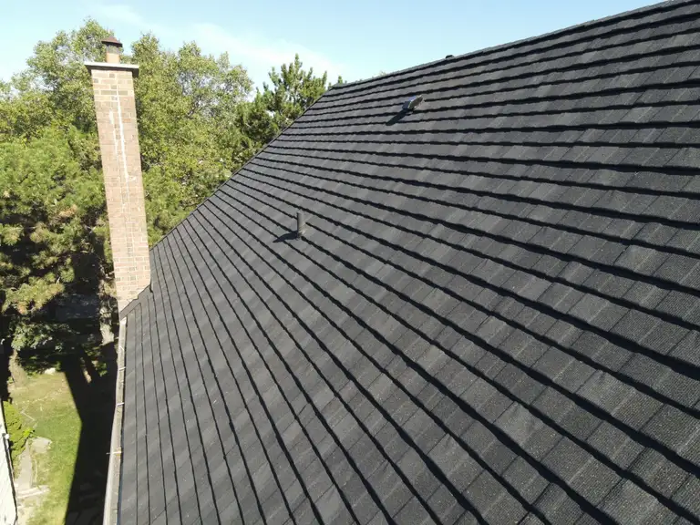 DECRA stone-coated metal roof installed by The Roofers