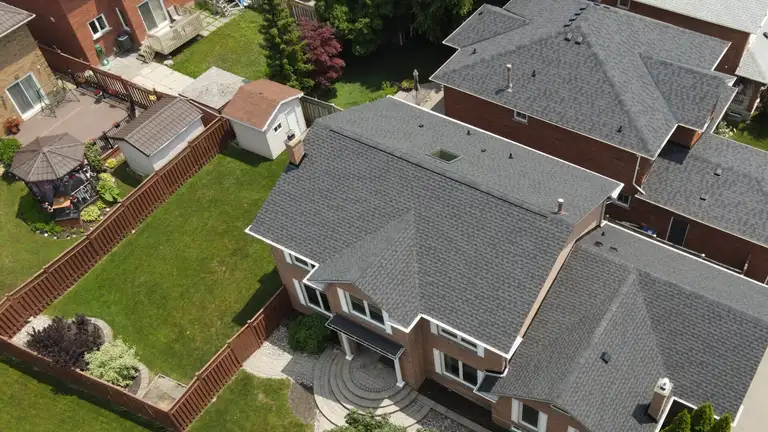 Asphalt shingle roof installed by The Roofers